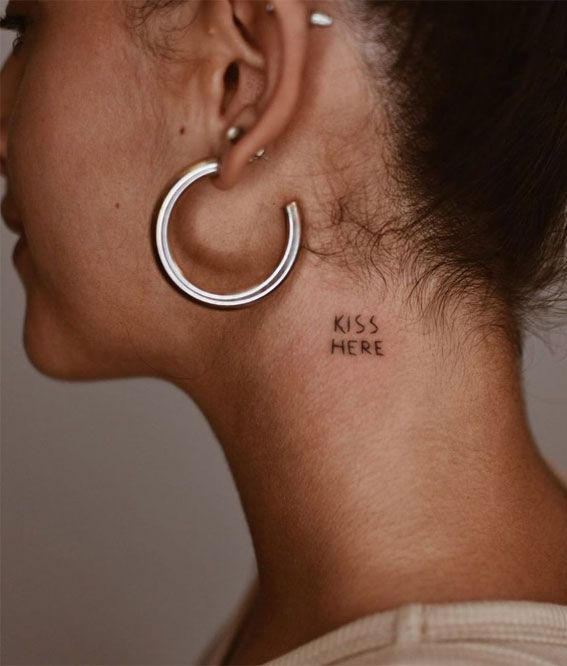 Neck Tattoo Kiss: Bold Ink Meets Intimacy